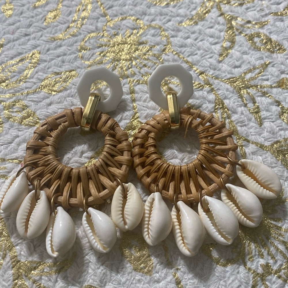 Fashionable Handmade woven seashells earrings with beach vacation style.